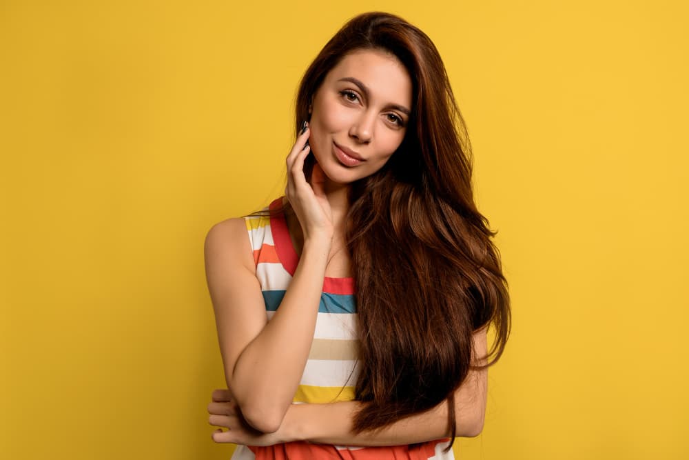 Girl has long dark hair