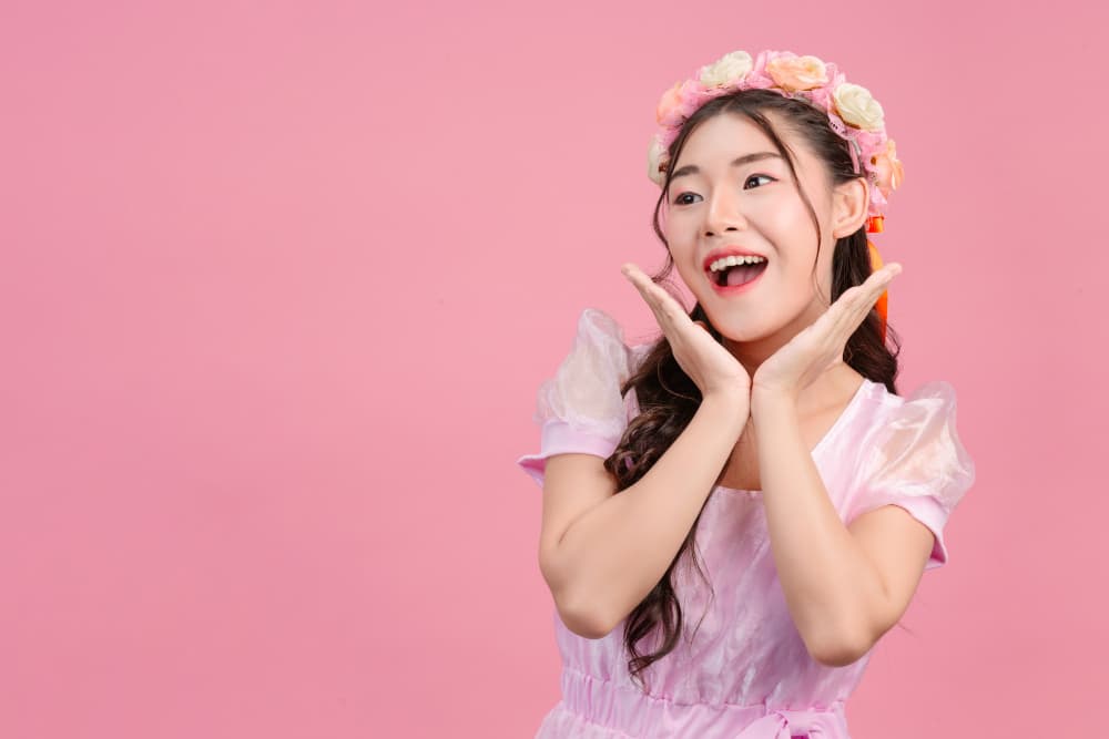 Girl is in beautiful pink princess dresses