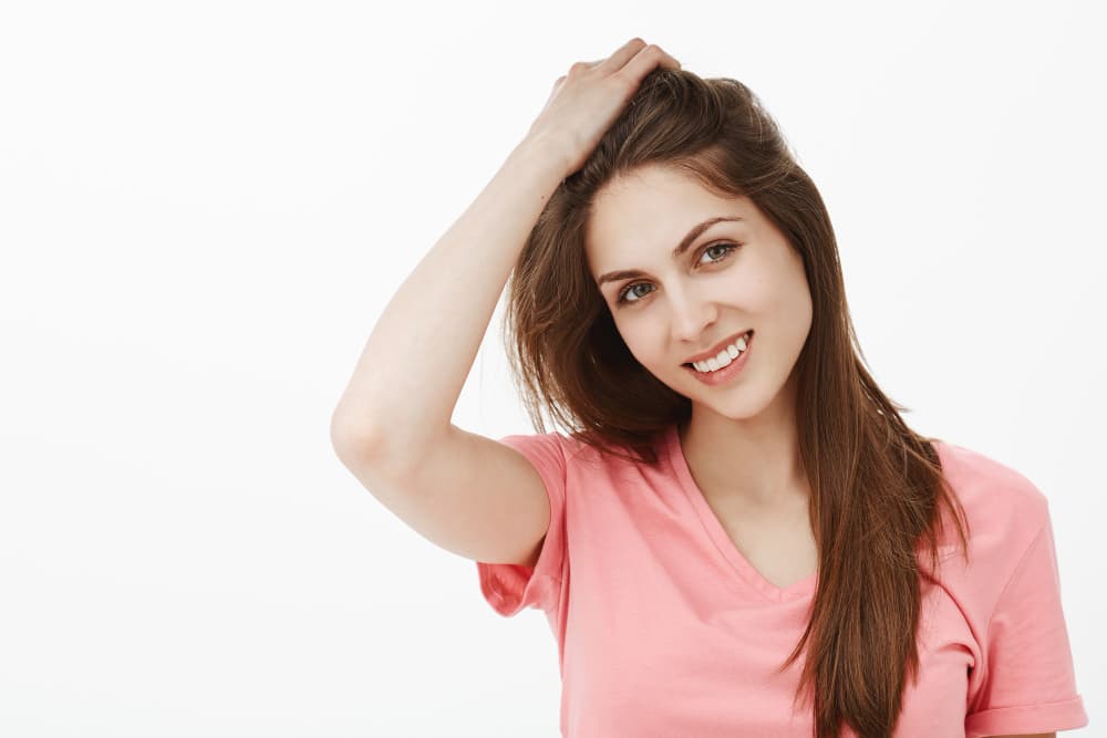 The girl is showing her detangled hair